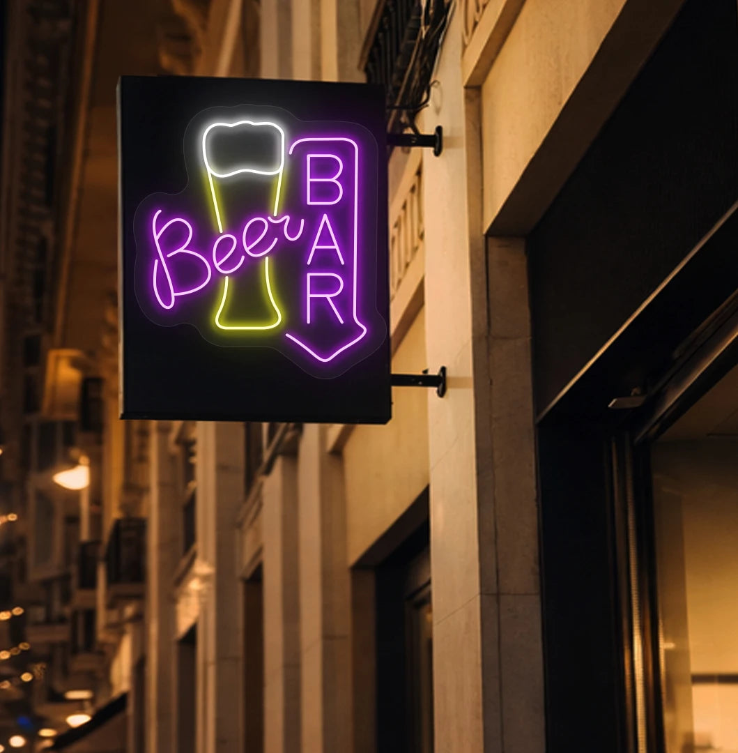Trendy beer bar arrow neon sign in purple mounted on wall.