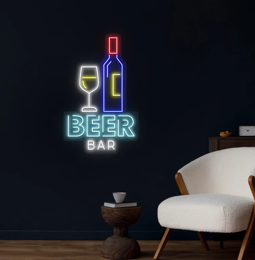 Modern wall decor with beer bar bottle neon sign glowing ice blue.