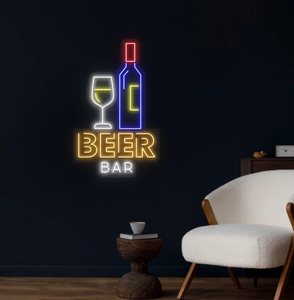 Trendy beer bar bottle neon sign in orange mounted on wall.
