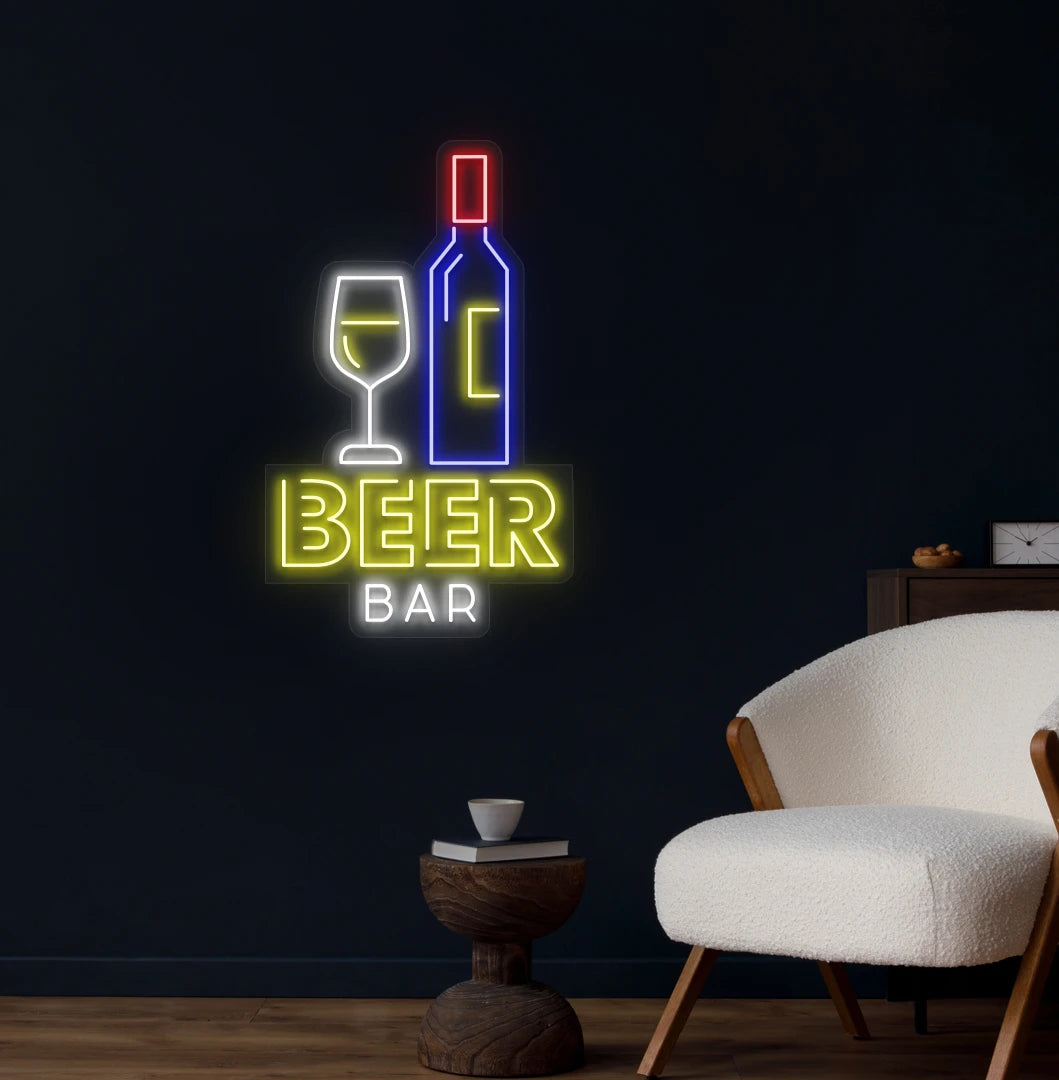 Trendy beer bar bottle neon sign in yellow mounted on wall.