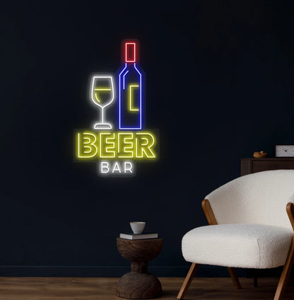 Trendy beer bar bottle neon sign in yellow mounted on wall.