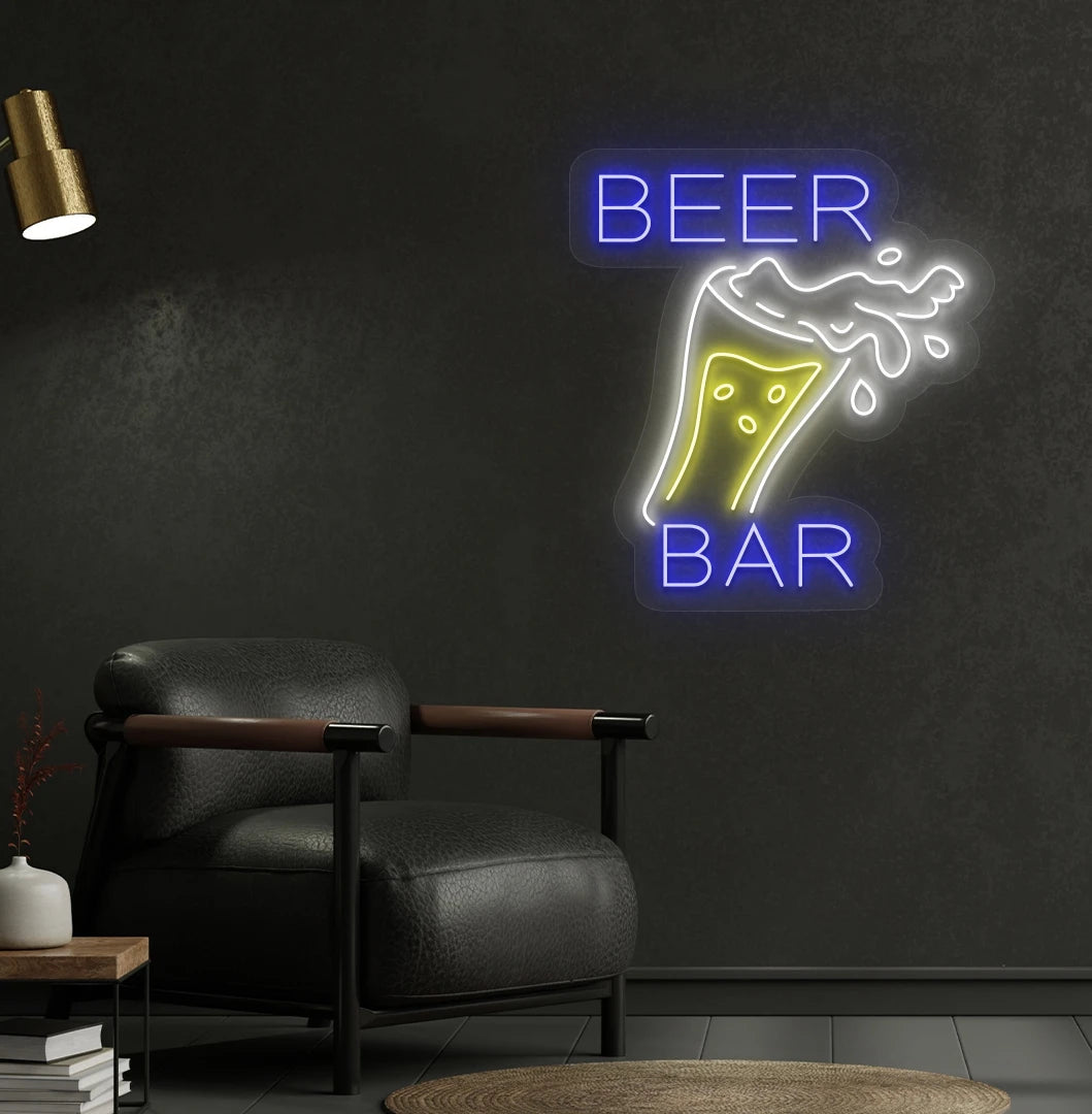 Image of a bright beer bar with glass neon sign mounted on a bar wall in blue color.
