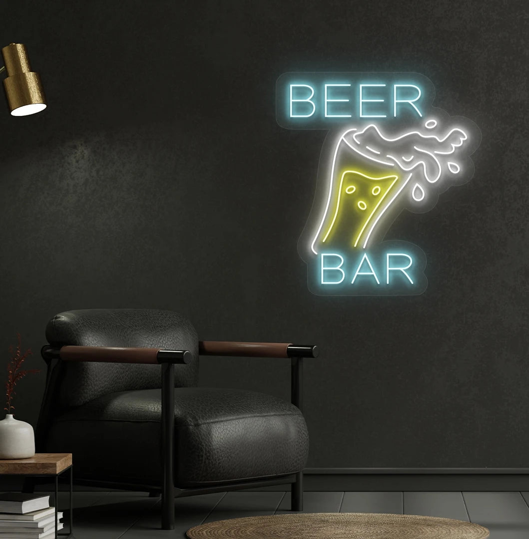 Image of a bright beer bar with glass neon sign mounted on a bar wall in ice blue color.