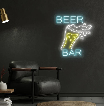 Image of a bright beer bar with glass neon sign mounted on a bar wall in ice blue color.