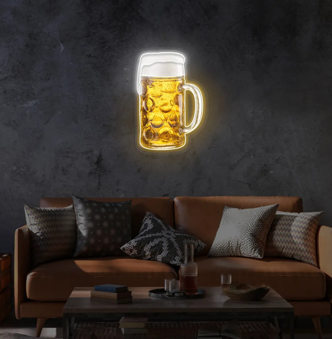 Beer Cup Neon Sign illuminated in orange and mounted on a wall.