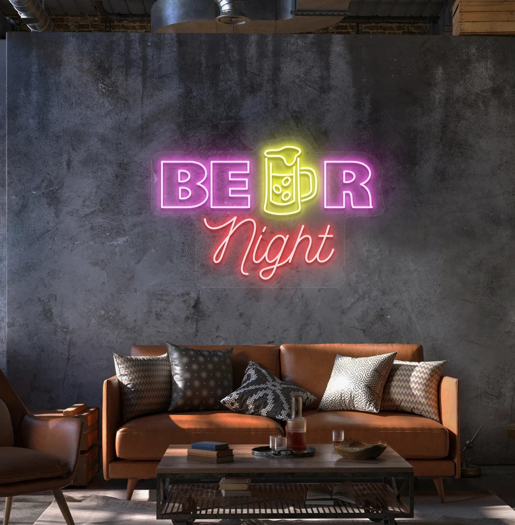 Modern wall decor with beer night neon sign glowing pink.