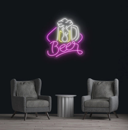 Modern wall decor with beer text and glass neon sign glowing pink.