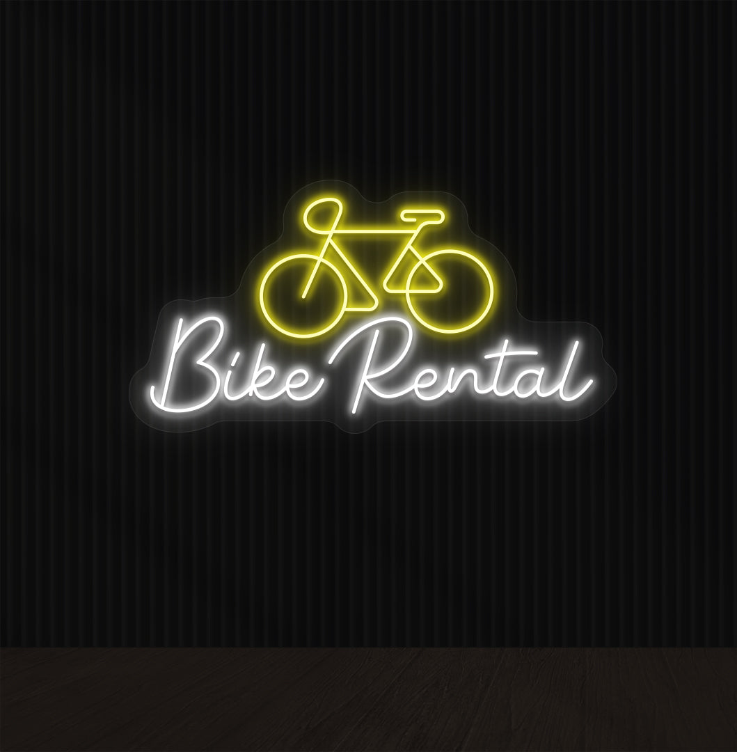 Bright yellow LED bike rental neon sign with cycle icon glowing on wall.