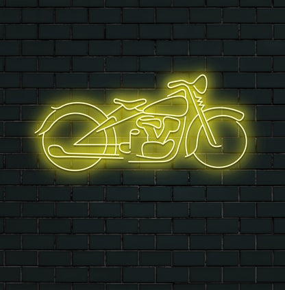 A modern wall with a bike neon sign glowing yellow. Perfect for bike lovers, garages, bike shops, and living spaces.