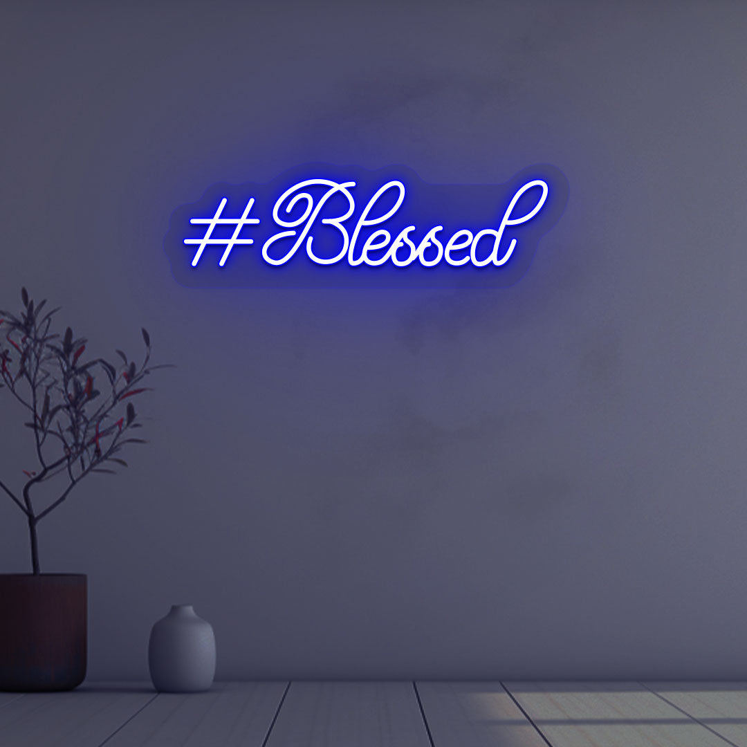 Image of a blessed LED neon sign on wall decor in blue color.