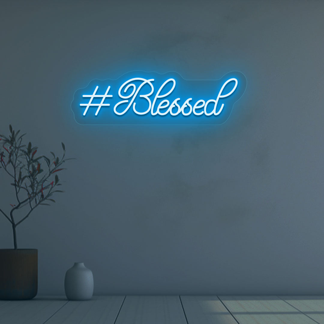 A soft ice blue LED-blessed neon sign is glowing on the wall. Perfect for bedroom and living room décor and home interiors.