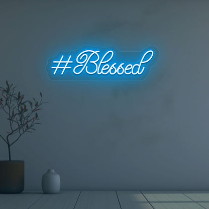 A soft ice blue LED-blessed neon sign is glowing on the wall. Perfect for bedroom and living room décor and home interiors.