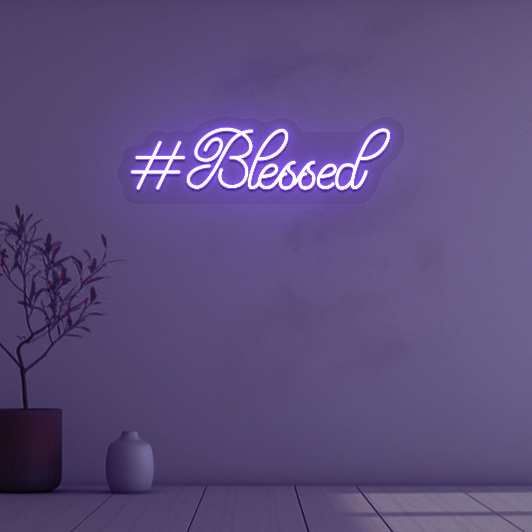 Stylish blessed purple LED neon sign mounted on wall. 