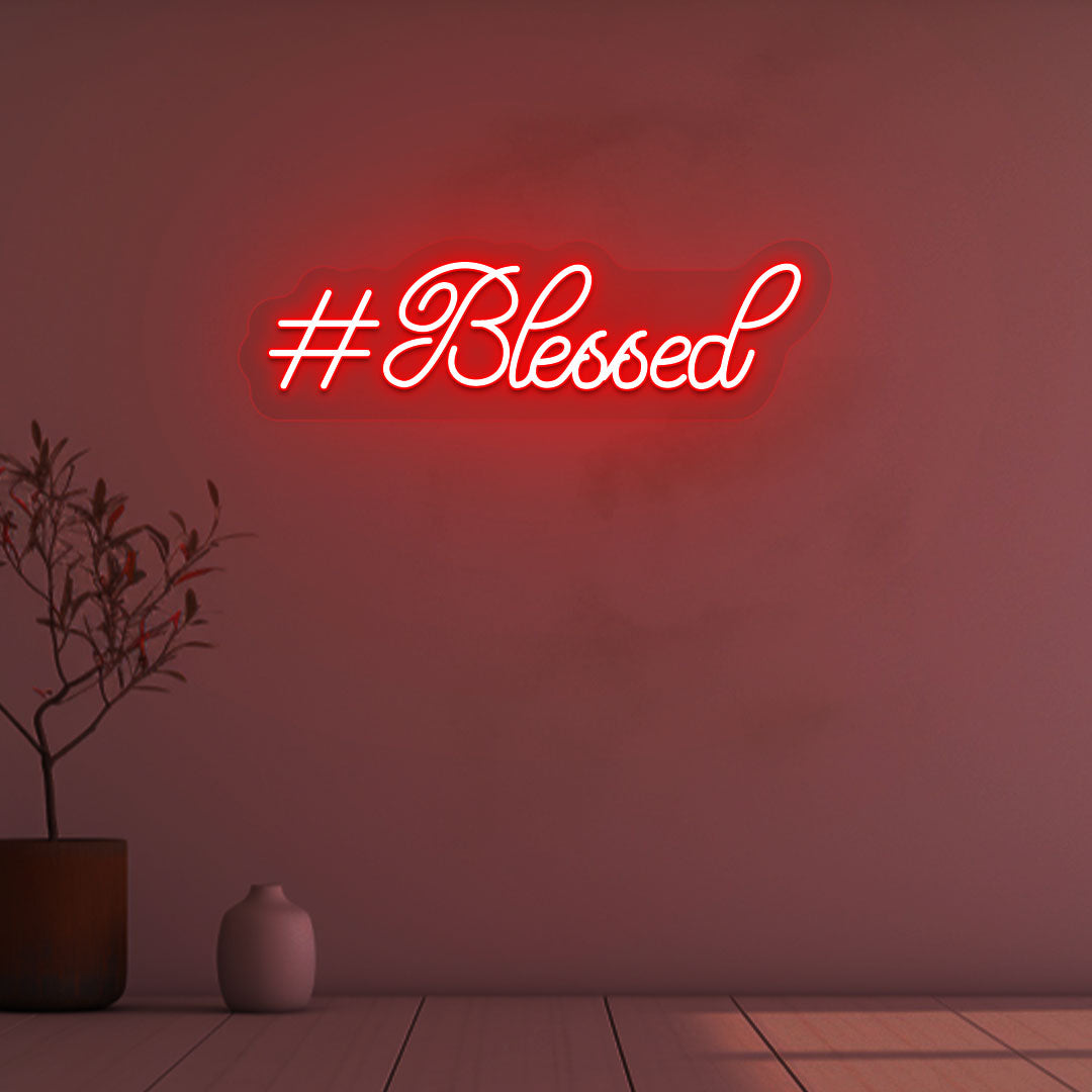 A soft red LED-blessed neon sign is glowing on the wall. Perfect for bedroom and living room décor and home interiors.