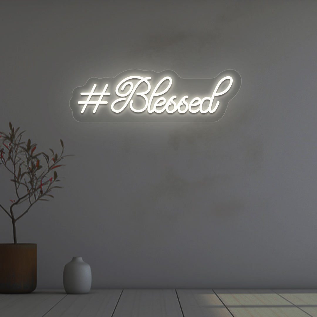 Image of a blessed LED neon sign on wall decor in warm white color.