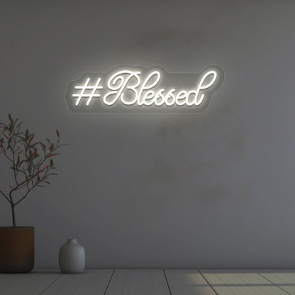 Image of a blessed LED neon sign on wall decor in warm white color.