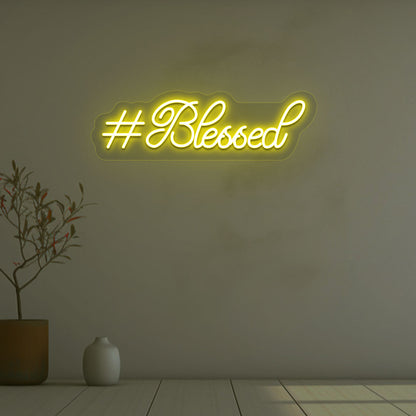 Image of a blessed LED neon sign on wall decor in yellow color.