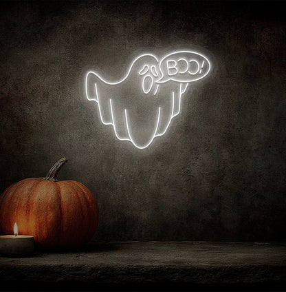 White LED Boo Ghost neon sign mounted on a Halloween themed wall.