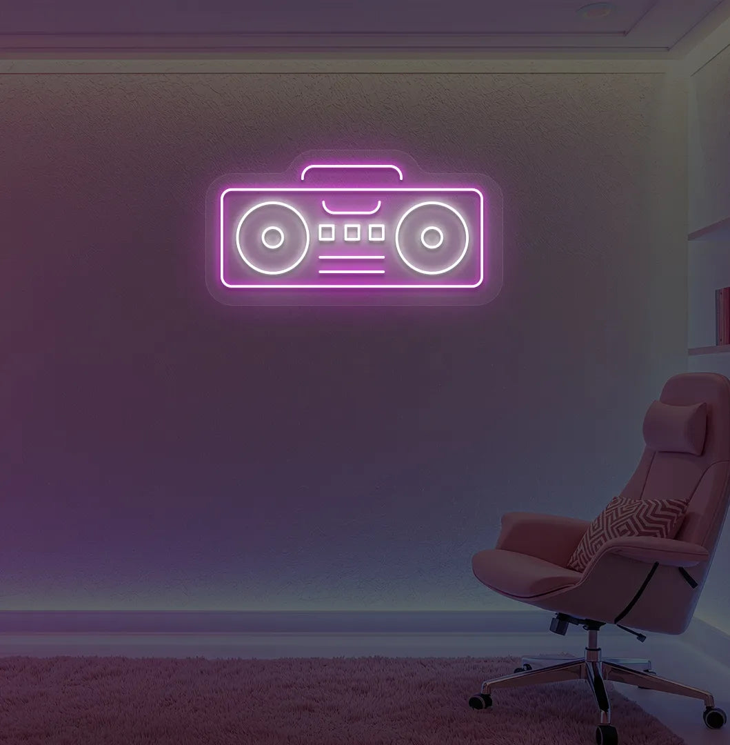 Image of a boombox neon sign in pink color mounted on gaming room wall.