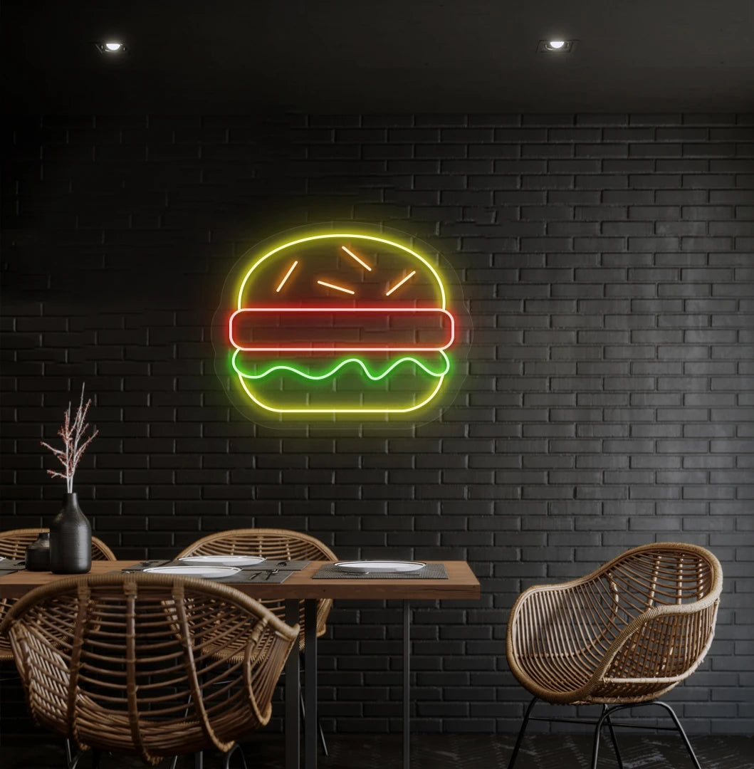 Image of a burger neon sign mounted on a cafe wall in multicolor.