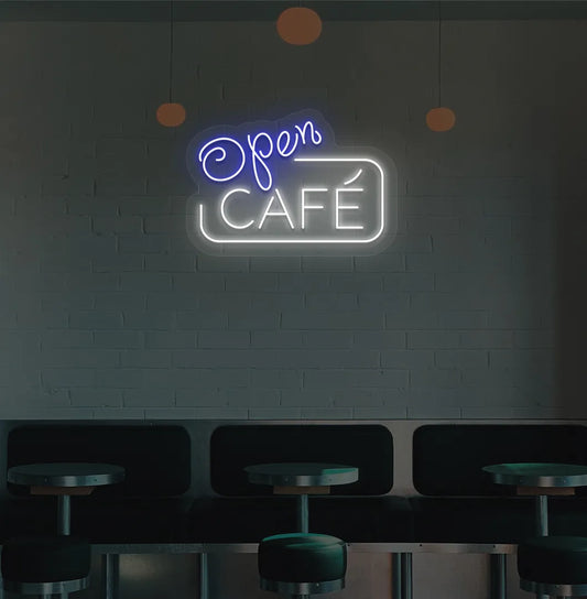 Image of a cafe wall with blue cafe open neon sign glowing brightly.