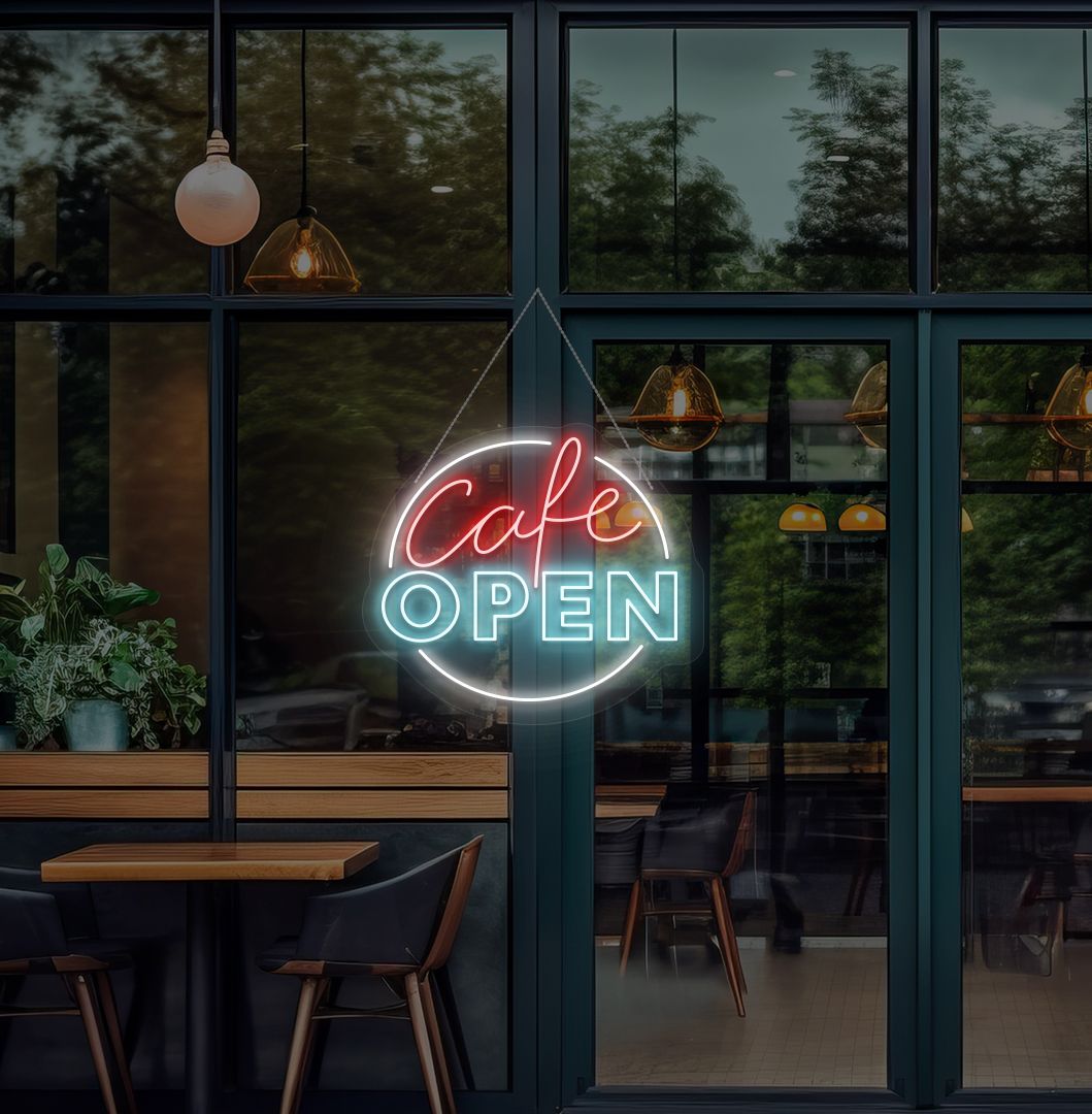 Image of a cafe's open neon sign glowing on the cafe glass door in ice blue.