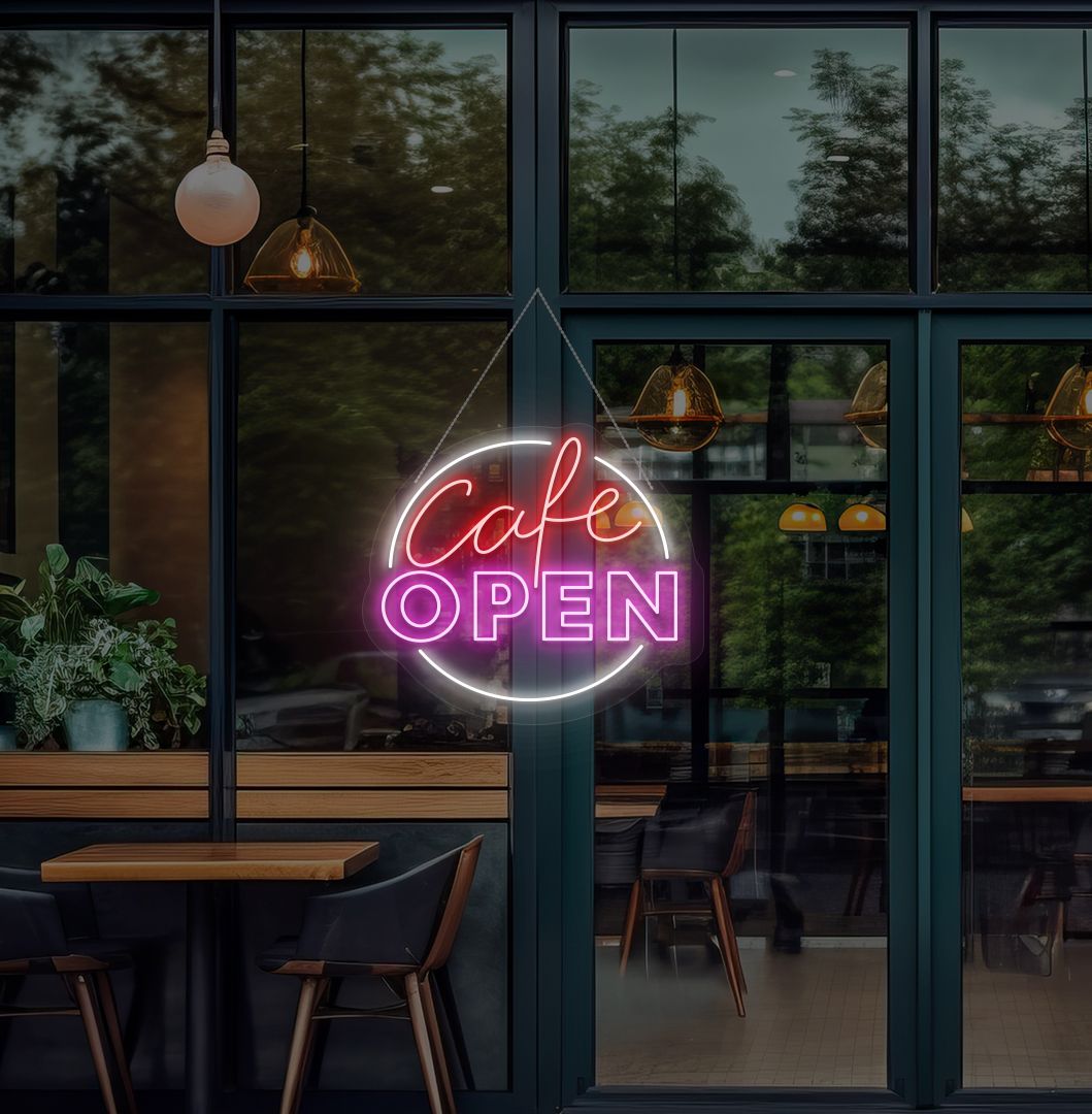 Image of a cafe's open neon sign glowing on the cafe glass door in pink.