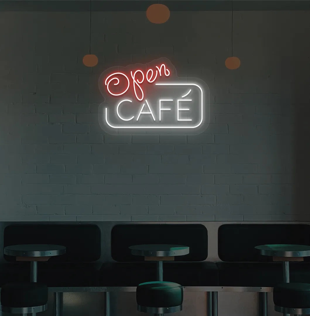 Image of a cafe wall with red cafe open neon sign glowing brightly.