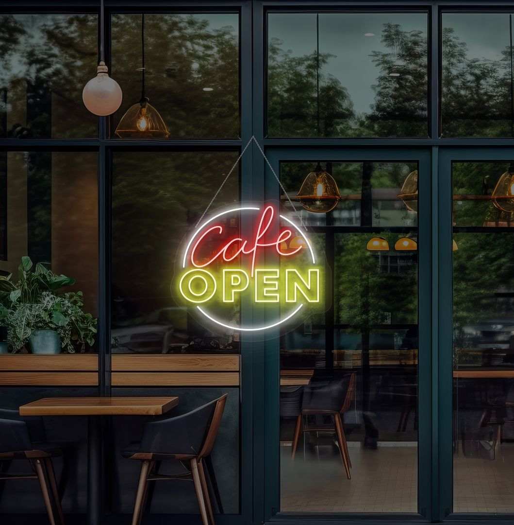 Modern cafe open neon sign glowing yellow on cafe door.
