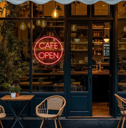 Image of a stylish cafe open in circle neon sign in red mounted on cafe wall.