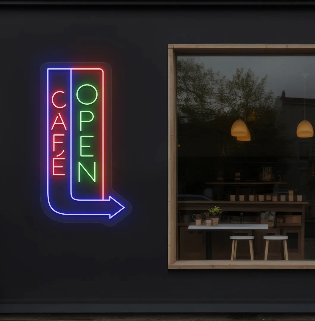 Trendy Cafe Open blue neon sign with arrow mounted on coffee shop wall.