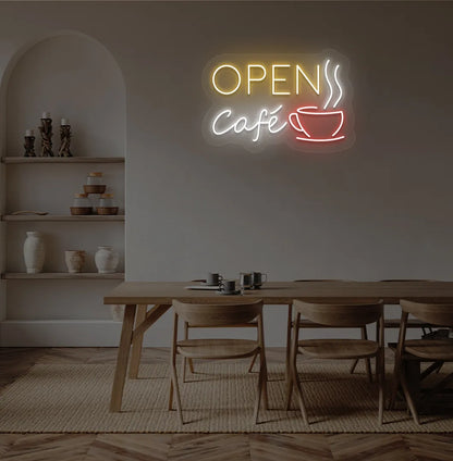 Stylish cafe open with coffee cup neon light in orange mounted on cafe wall.