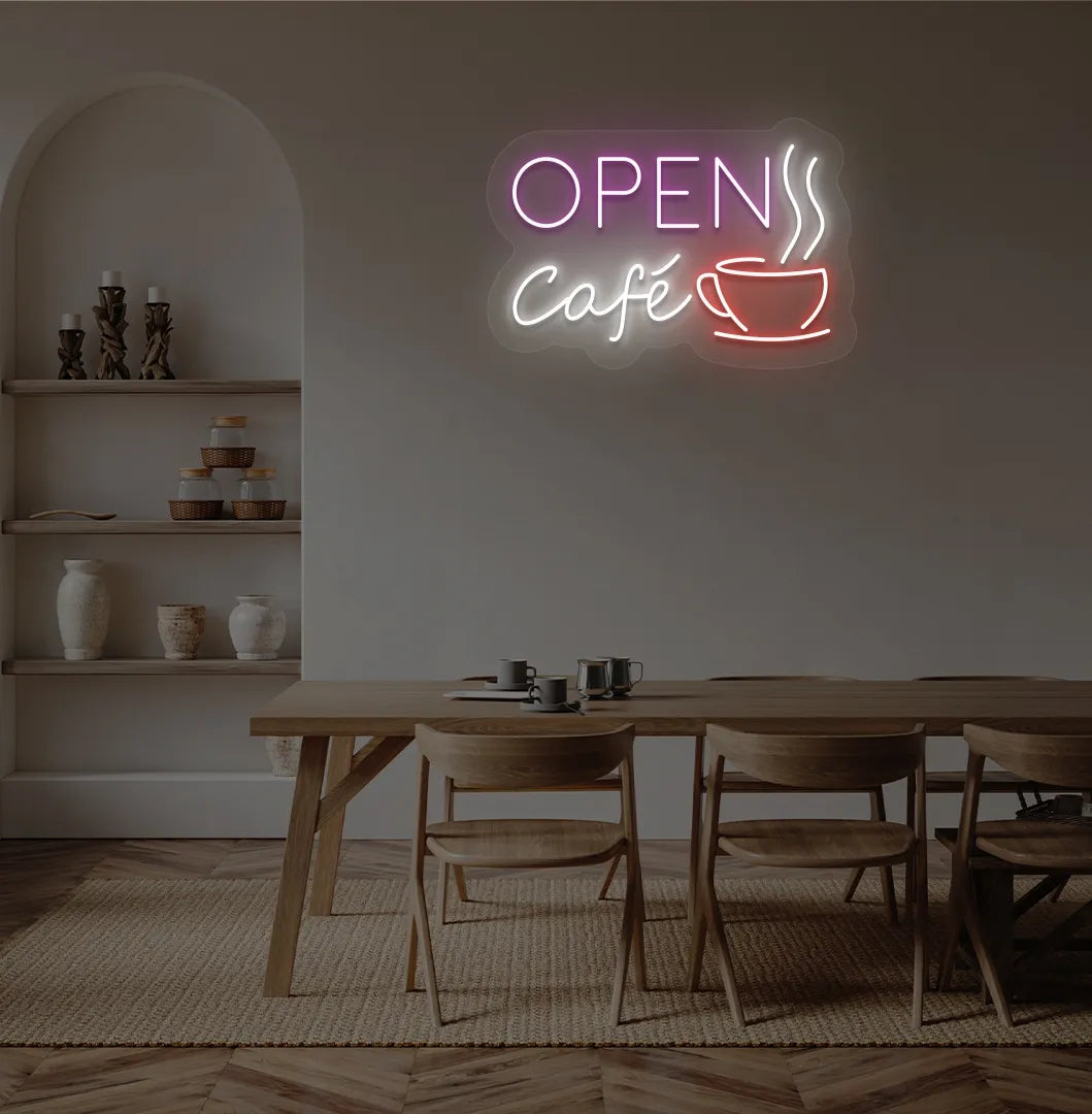 Stylish cafe open with coffee cup neon light in purple mounted on cafe wall.