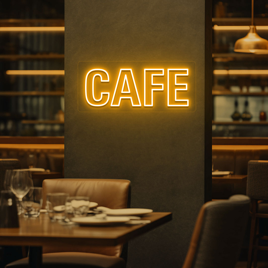 A stylish orange LED cafe neon sign is glowing on the cafe wall. Perfect for coffee shops and home coffee corners.