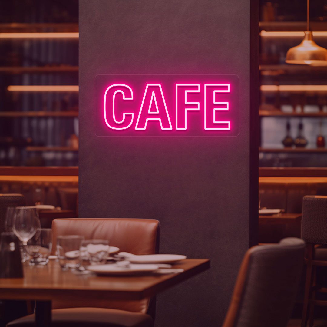 Image of a cafe LED neon sign mounted on a cafe wall in pink color.