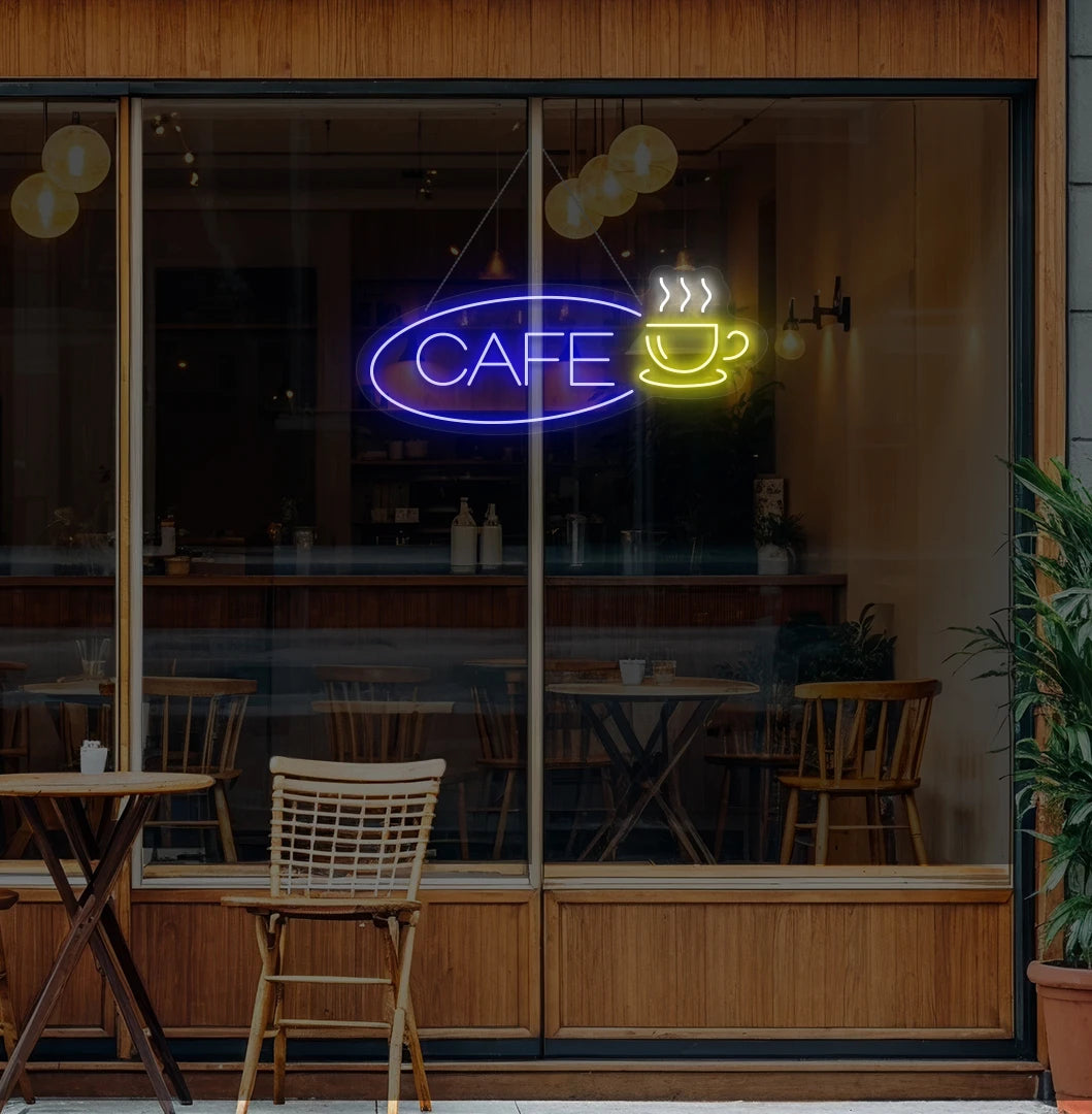 Modern wall decor with cafe cup neon sign glowing blue.