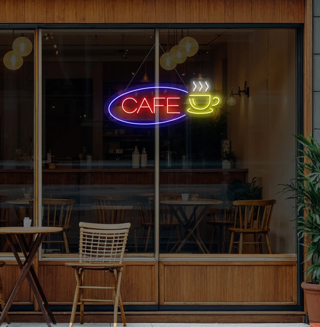 Modern wall decor with cafe cup neon sign glowing red.
