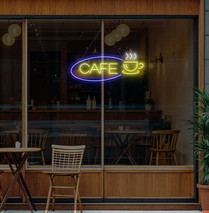 Image of a cafe cup neon sign glowing yellow on cafe door.