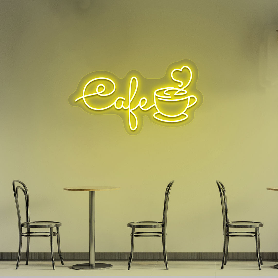 Image of a cafe with a mug LED neon sign hanging on an aesthetic cafe wall in yellow color.