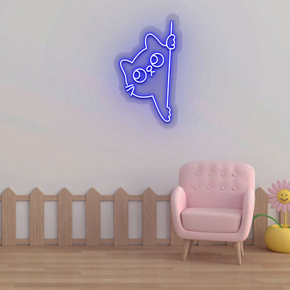 Stylish blue LED cat neon sign peeking design mounted on kids' room wall.