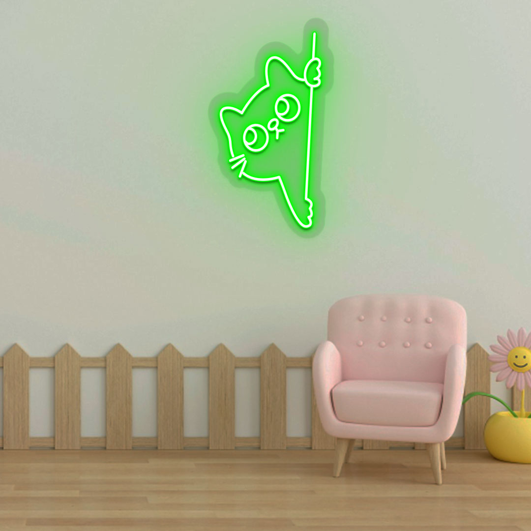 Image of a peeking cat LED neon sign hanging on a kid's bedroom wall in green color.