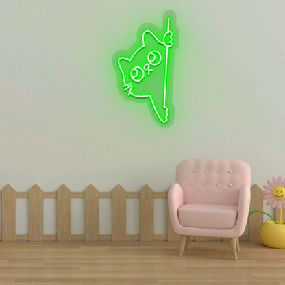 Image of a peeking cat LED neon sign hanging on a kid's bedroom wall in green color.