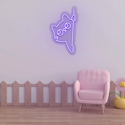 A cute peeking cat purple LED neon sign is glowing on the wall. Perfect for kids’ rooms, nurseries, playrooms, and activity areas.