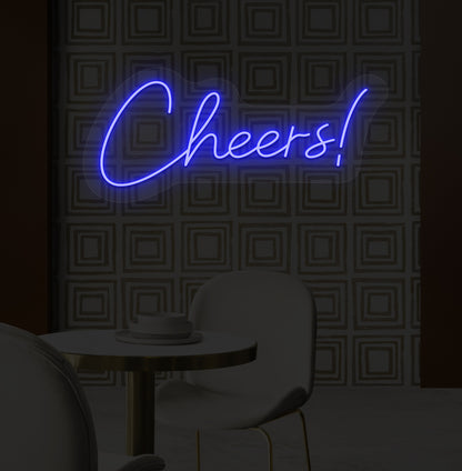 Image of a "cheers" LED neon sign mounted on a modern bar wall in blue color.