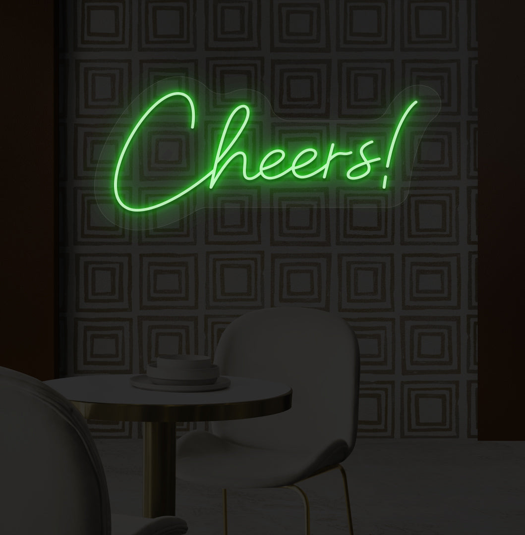 Decorative green LED cheers neon sign glowing on bar wall.