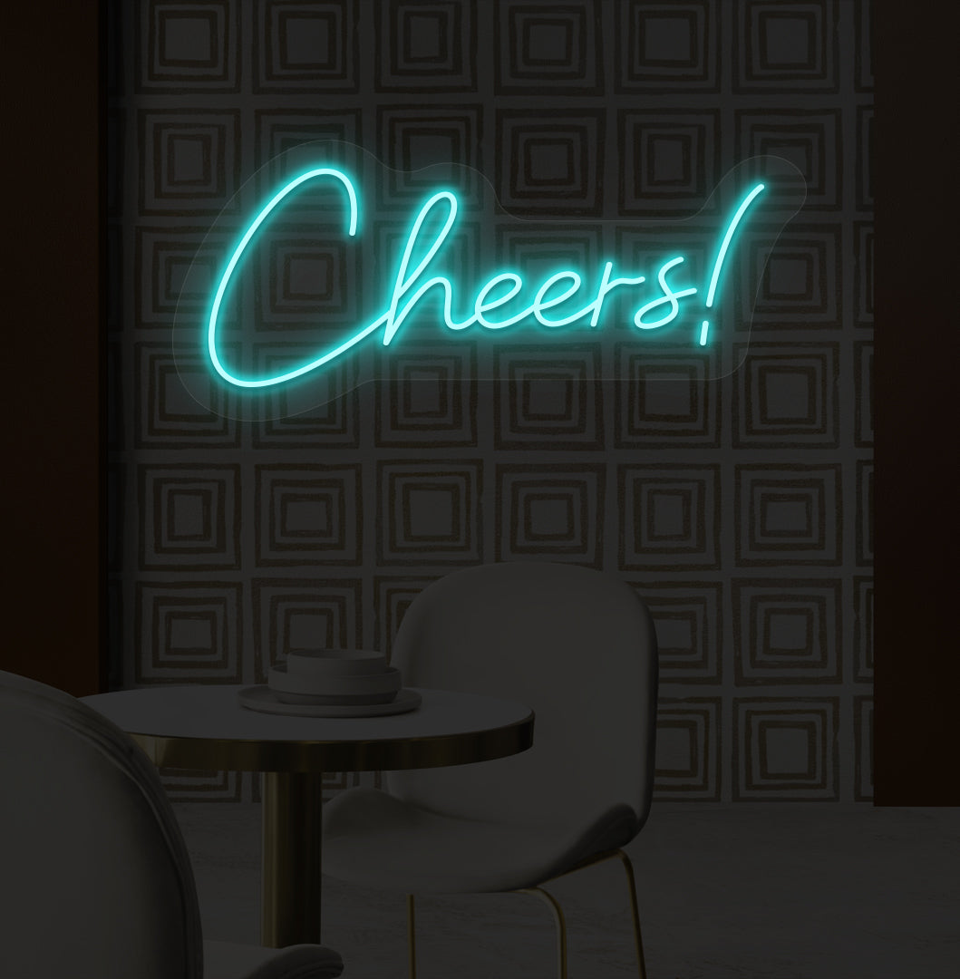 Image of a "cheers" LED neon sign mounted on a modern bar wall in ice blue color.