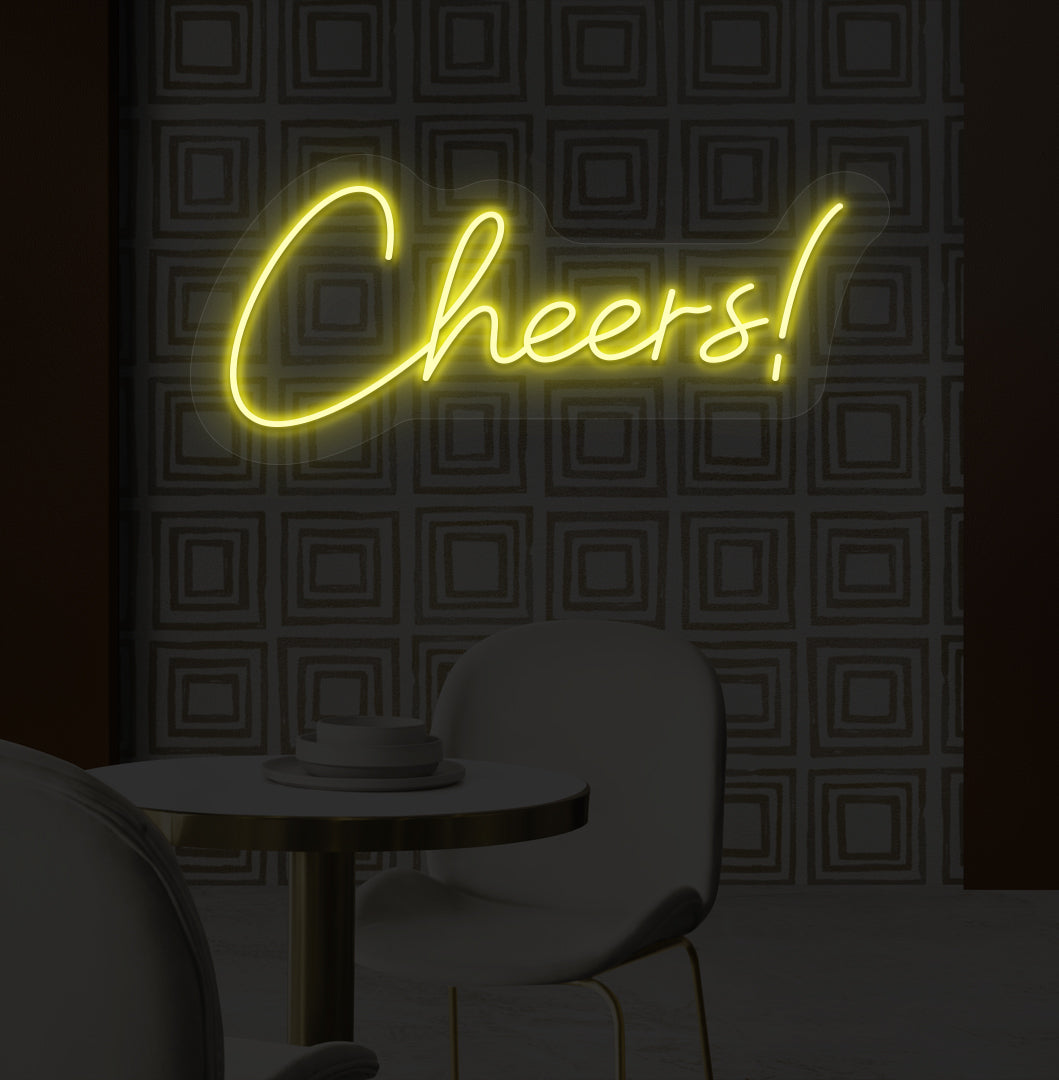 Image of a "cheers" LED neon sign mounted on a modern bar wall in yellow color.