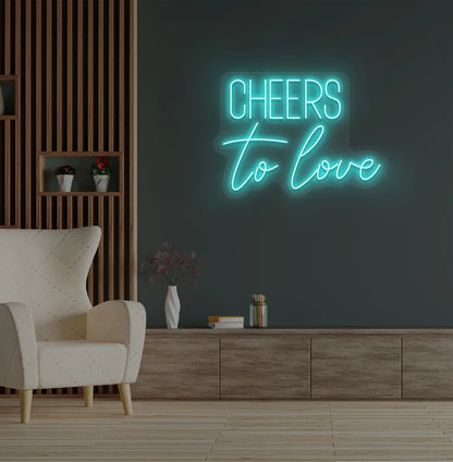 Modern wedding backdrop featuring Cheers to Love ice blue neon sign.