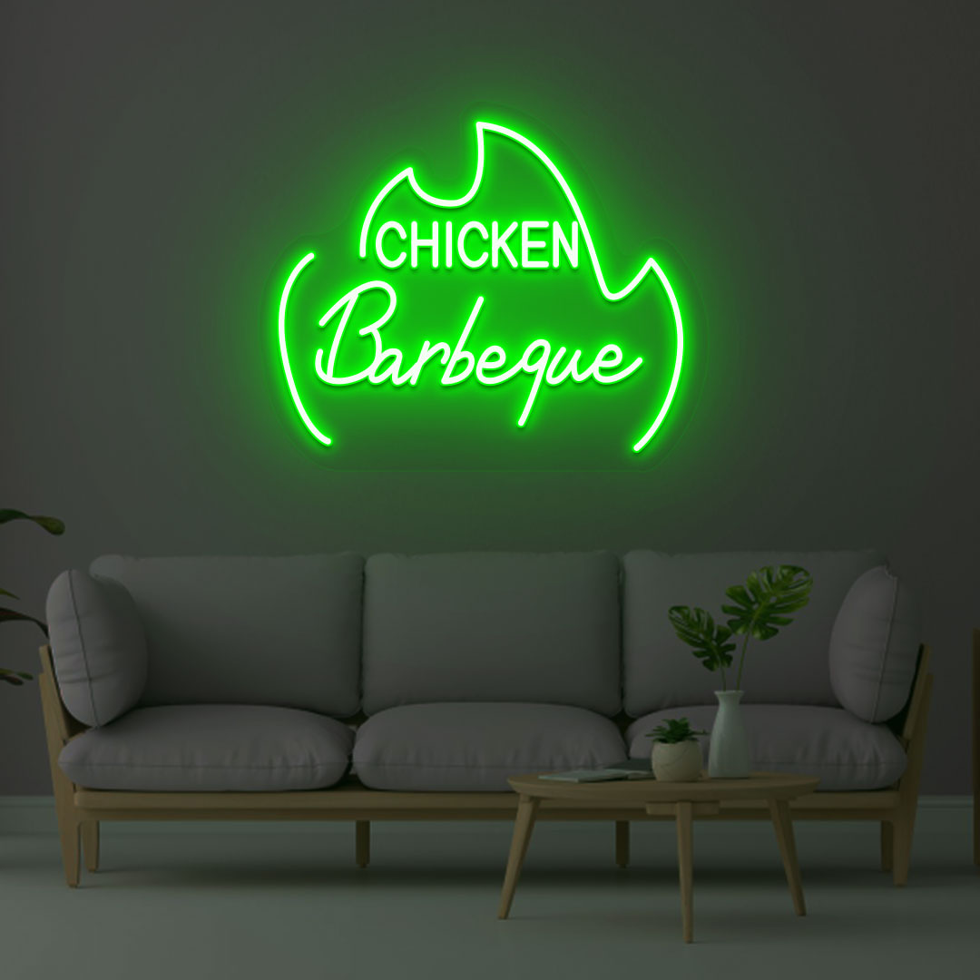 Image of a chicken barbeque neon sign mounted on a wall in green color.