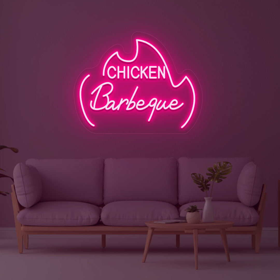 A bright pink LED chicken barbeque neon sign is glowing on the wall.